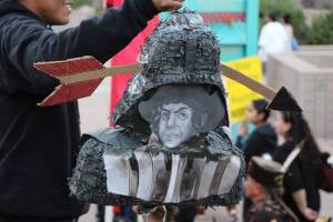 In the tradition of the Dump Trump pinatas that have become iconic at anti-Trump and anti-racism protests in the immigrant community, Albuquerque's IPD march featured a Columbus pinata that was ceremonially smashed at the end of the rally. 