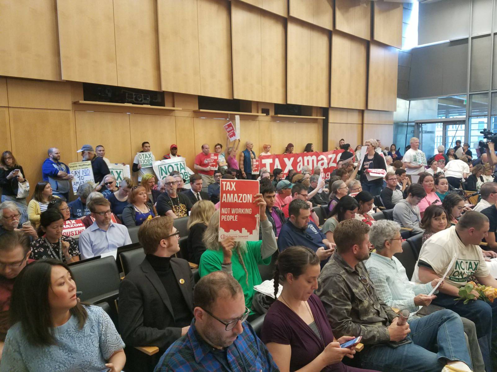 People attending City Council meeting, June 12, where members voted 7-2 to repeal the head tax. Liberation photo: Eric Buerk