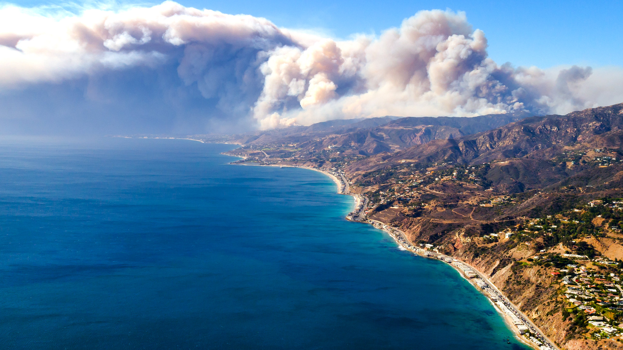 The Woolsey Fire seen from above. (Photo courtesy of Peter Buschmann) Public Domain photo by Forest Service-USDA.