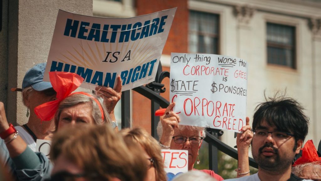 Rally for Carney Hospital outside the Massachusetts State House in Boston, Aug. 28. Liberation Photo: Micah Fong