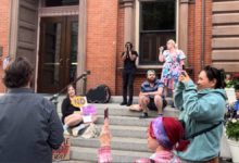 New Bedford community members rally outside City Hall on July 22 to celebrate defeat of the BID proposal. Liberation Photo: Dave Pimentel