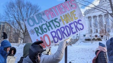 Health care workers protest ICE terror. Liberation photo